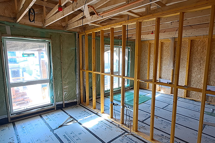 Aug 2024 - South Street, Lancing - inside, internal partition wall frames in place and services being installed (1)