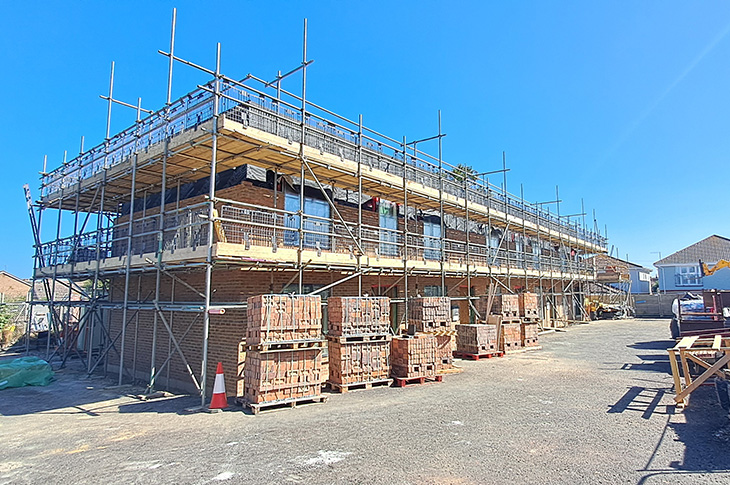 Aug 2024 - South Street, Lancing - the brick outer skin of the walls is going up