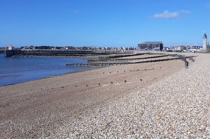 Kingston Beach - looking west towards the lighthouse and RNLI station