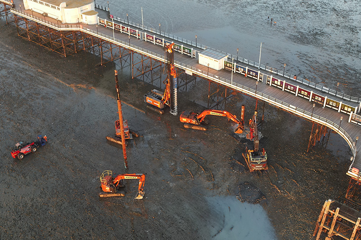 Worthing Pier - aerial view of the works on the pier - side view close up (15-11-2024)