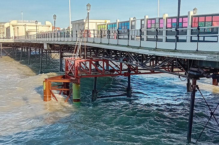 Worthing Pier - the piers, trusses, scaffolding and temporary working platform on the pier - close up (29-11-2024)